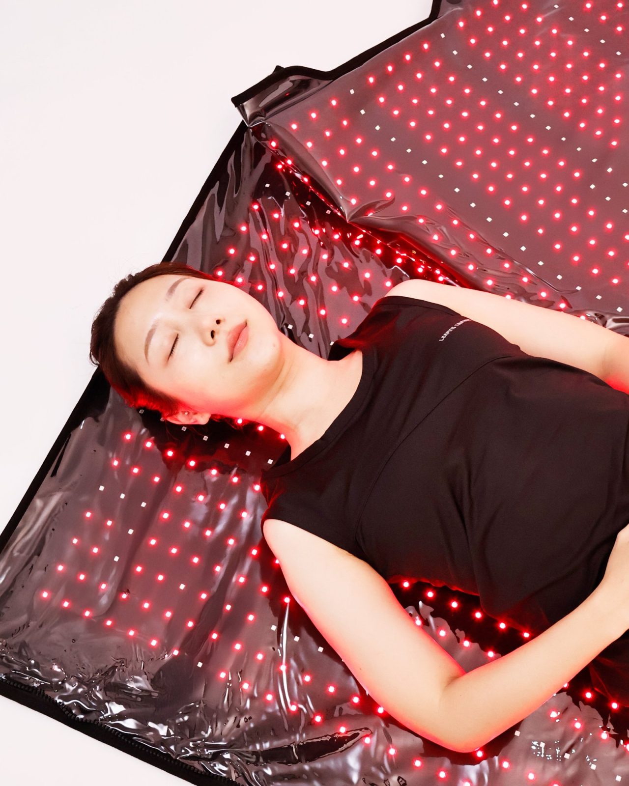 ถุงนอนกับเสื่อบำบัดด้วยแสงสีแดง